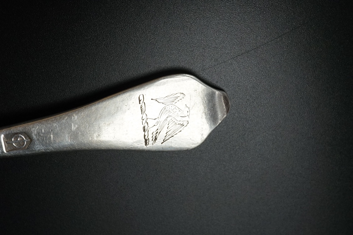 A Queen Anne Britannia standard silver dog nose spoon, by William Scarlett, London, 1702, wit rat-tail bowl and later? engraved crest, 19.3cm, 57 grams.